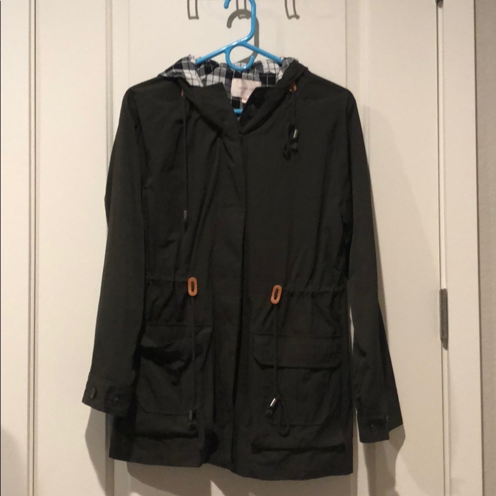 Hooded jacket with cinch waist.